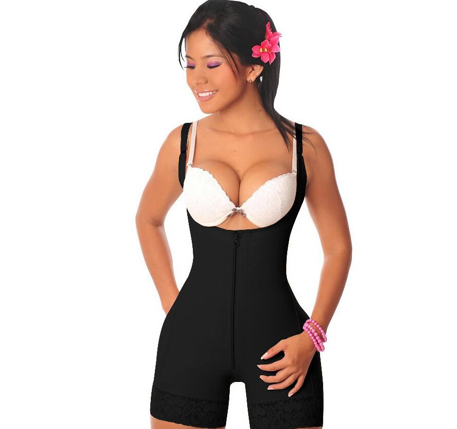 Woman wearing a black shapewear garment on a white background